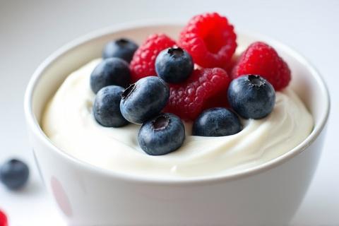 Greek yogurt topped with fresh mixed berries.